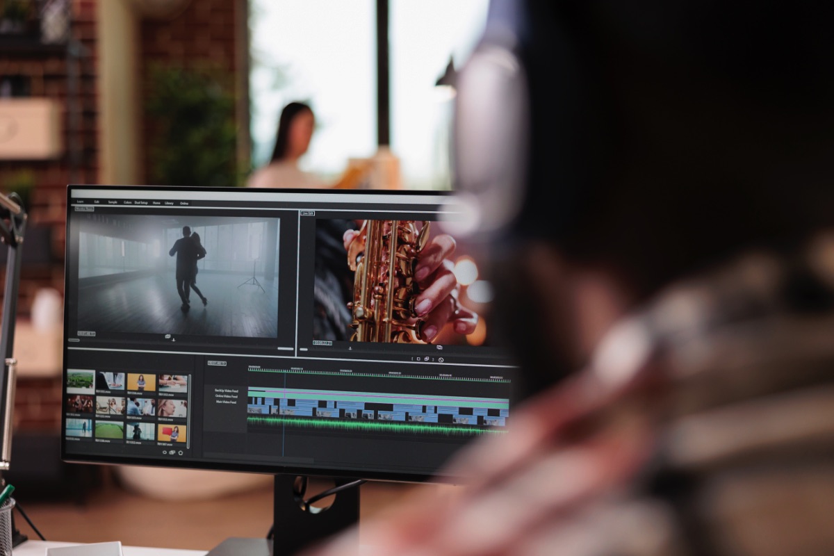Professional video editor looking at a project on screen. Video production company in Edmonton and Calgary uses this as a key component of the production process.